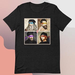 Peut inclure: Un t-shirt noir avec un graphique de quatre artistes de la Renaissance célèbres portant des masques de Teenage Mutant Ninja Turtles. Les artistes sont Léonard de Vinci, Michel-Ange, Donatello et Raphaël.