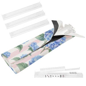Floral hydrangea Mahjong tile bag with pink stripes and clear tile rack displayed on a Mahjong table with white mat and tiles arranged around the table.