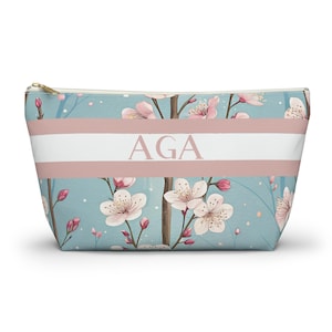 Cherry blossom personalized mahjong tile bag with zipper closure on a white background, designed for storing tiles and small game accessories.