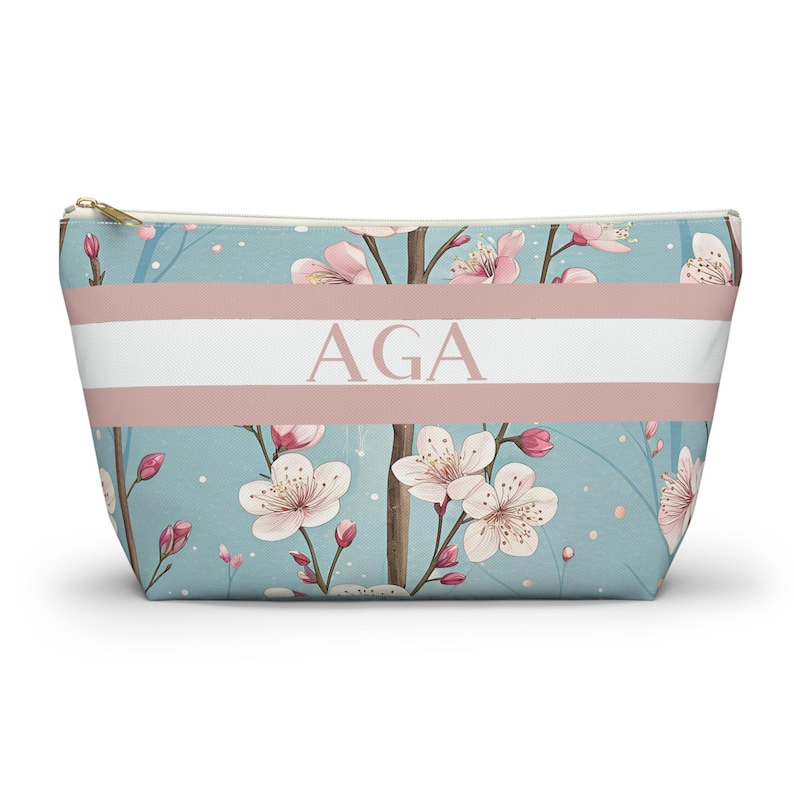 Cherry blossom personalized mahjong tile bag with zipper closure on a white background, designed for storing tiles and small game accessories.