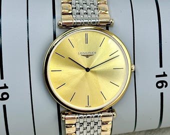 Reloj Longines Le Grande Classique vintage 100% auténtico con esfera dorada y brazalete bicolor, fabricado en Suiza.