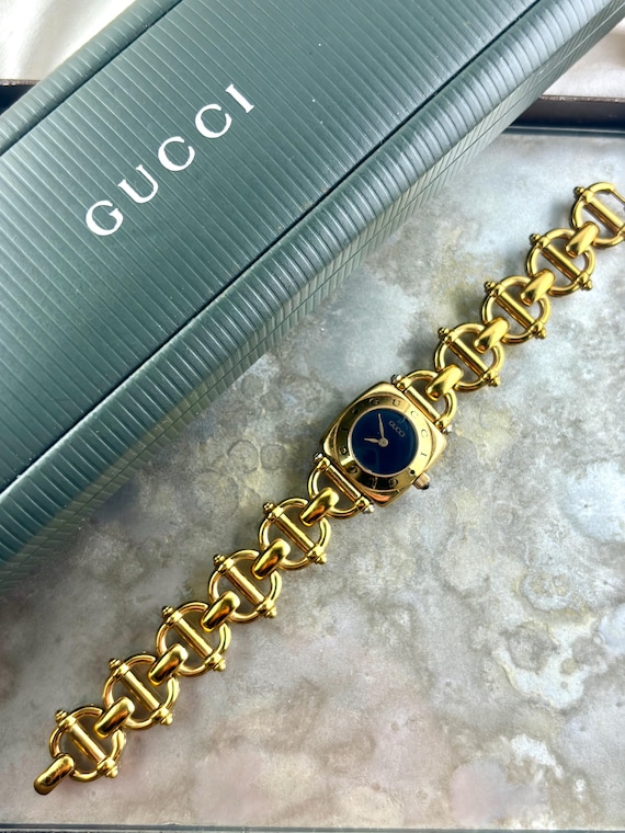 100% Authentic Gucci 6400L Watch Gold Tone Women display picture 3