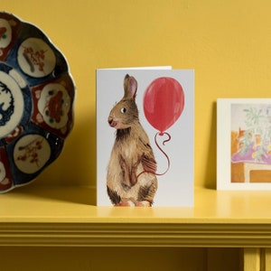 Cartão de felicitações de coelho de aniversário