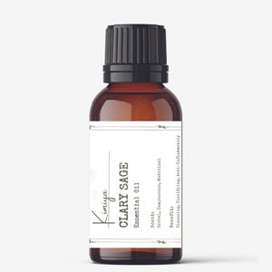 May include: A brown glass bottle with a black cap, labeled "Kiniya Clary Sage Essential Oil". The label also includes the scent and benefits of the oil.