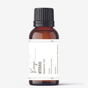 May include: A brown glass bottle of Kimiya Myrrh Essential Oil with a black cap. The label reads "MYRRH Essential Oil" with scent and benefit details. The oil is described as rich, balsamic, warm, and beneficial for healing, grounding, and anti-inflammatory purposes.