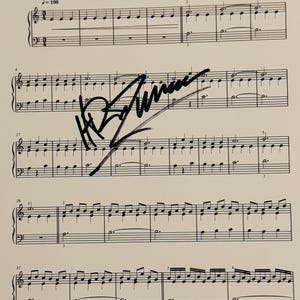 Hans Zimmer Autographed Sheet Music With COA
