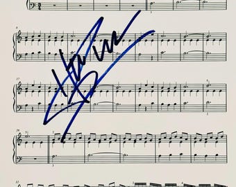 Hans Zimmer Autographed Sheet Music With COA
