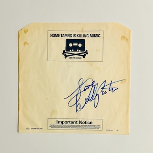 Dolly Parton Autographed Vinyl Inner Pouch With COA