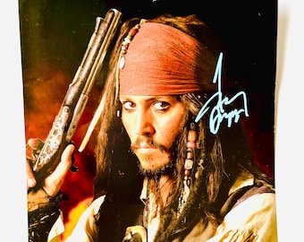 ジョニー・デップのサイン入り8x10パイレーツ・オブ・カリビアン