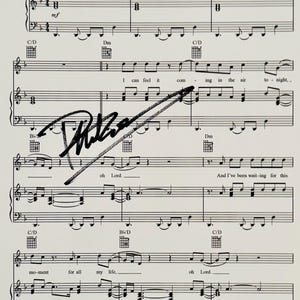 Phil Collins Autographed Sheet Music With COA