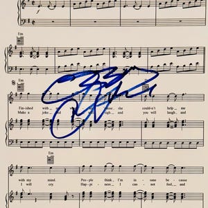 Ozzy Osbourne Autographed Sheet Music With COA