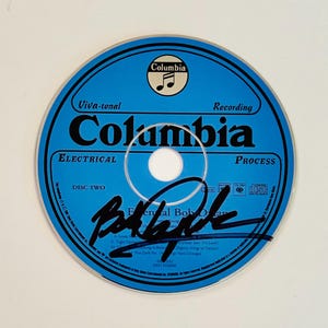 Gesigneerde cd van Bob Dylan met COA
