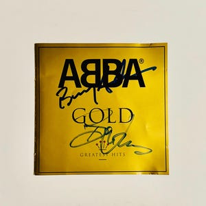 ABBA Gold Benny Andersson & Björn Ulvaeus Portada del CD autografiada con COA