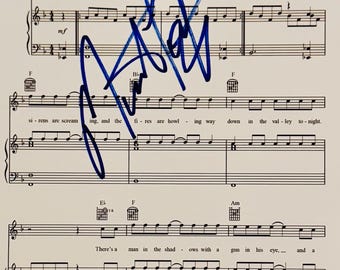 Partitura autografiada de Meat Loaf con certificado de autenticidad.