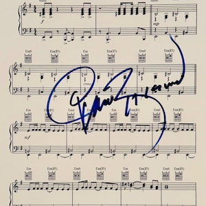 Pierce Brosnan Bond Theme handsignierte Notenblätter mit Echtheitszertifikat