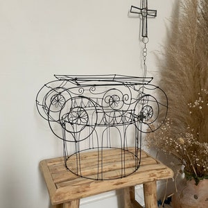 Antique wire capital, wire sculpture