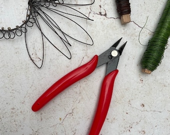 Precision cutting jewelry pliers, ideal for working wire.