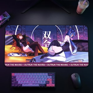 May include: A rectangular mouse mat with a vibrant anime-style illustration of two figures leaning on cars. The background shows a cityscape with the text "双令" and "RUN THE WAVES". A keyboard and mouse are in the foreground.