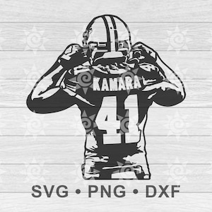 Peut inclure: Silhouette noire et blanche d'un joueur de football américain portant un maillot avec le nom "KAMARA" et le numéro "41".