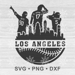 May include: Black and white silhouette of three baseball players in front of a cityscape with the text "LOS ANGELES" and a baseball graphic. The players are wearing jerseys with the names "BETTS", "OTANI", and "FREEMAN" and their corresponding numbers.