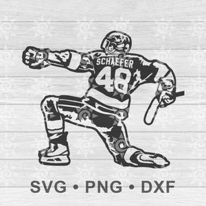 May include: Black and white illustration of a hockey player in action, kneeling with one leg extended and arm raised. The player wears a helmet and jersey with the name "SCHAEFER" and the number "48". The image includes "SVG • PNG • DXF" text.
