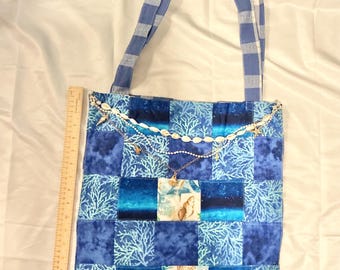 Quilted beach themed tote with shell charm and chains