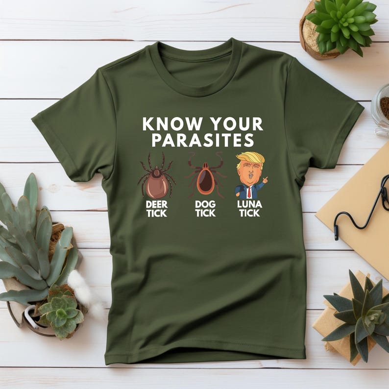 May include: A green t-shirt with the text "KNOW YOUR PARASITES" and three illustrations. The illustrations are of a deer tick, a dog tick, and a cartoon of Donald Trump labeled "LUNA TICK".