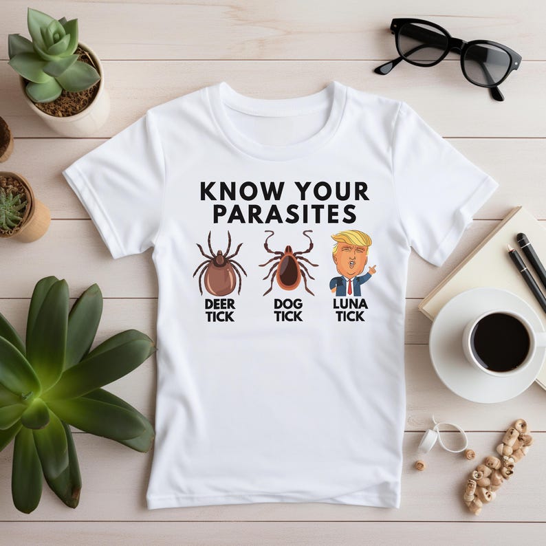 May include: White t-shirt with the text "KNOW YOUR PARASITES" and illustrations of three ticks labeled "DEER TICK", "DOG TICK", and "LUNA TICK".