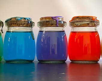 Frasco de poción mágica que cambia de color