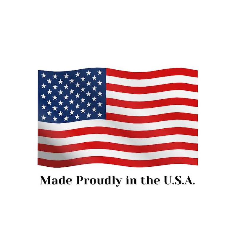 May include: A graphic illustration of the United States flag featuring a blue canton with white stars and thirteen horizontal red and white stripes. Below the flag, the text reads Made Proudly in the U.S.A. in a black serif font.
