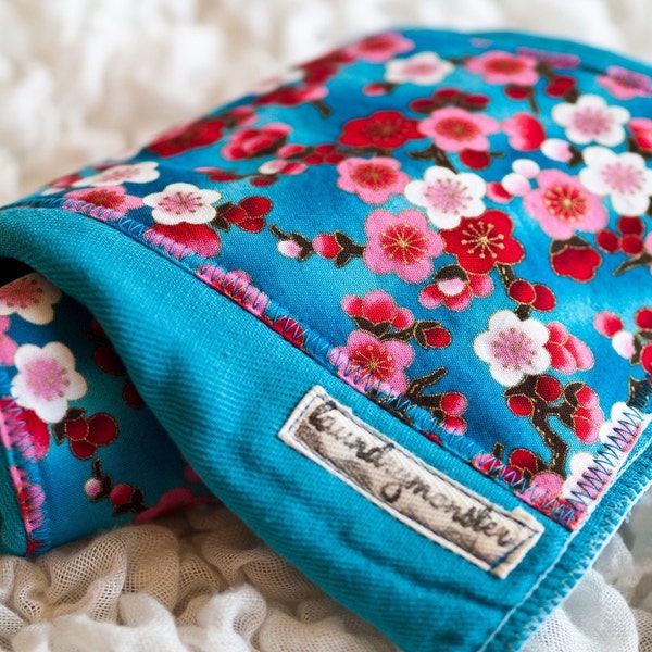 Tropical bright blue sakura blossoms burp cloth