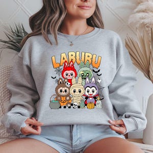Labubu Doll Halloween Shirt, Kawaii Monsters T-shirt, Spooky Labubu Sweatshirt, Kids Halloween Shirt, Trendy Cute Horror Monster Doll Hoodie
