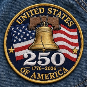 May include: Embroidered patch featuring the Liberty Bell, American flag, and text "UNITED STATES 250 OF AMERICA 1776-2026." The patch is circular with a gold border and is set against a denim background.