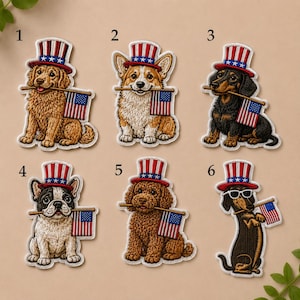 May include: Embroidered patches featuring various dog breeds, each wearing a patriotic top hat and holding a small American flag. The dogs include a Golden Retriever, Corgi, Dachshund, French Bulldog, Poodle, and another Dachshund wearing sunglasses.