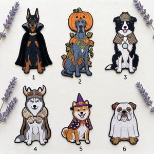 May include: Six embroidered iron-on patches featuring dogs in costumes: a Doberman as a vampire, a Great Dane in a pumpkin, a Border Collie as a detective, a Husky as a Viking, a Shiba Inu as a wizard, and a Bulldog wearing a white ghost sheet.