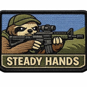 May include: Embroidered patch featuring a sloth wearing a cap and holding a rifle with a scope. The sloth is brown and tan, set against a blue sky and green field. The text "STEADY HANDS" is below the sloth.