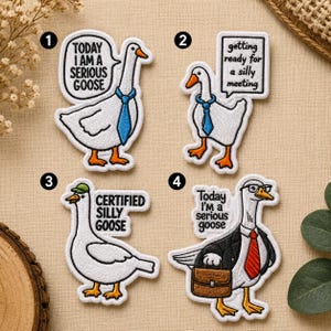 May include: Set of four embroidered patches featuring cartoon geese. Each goose wears a tie or accessories and has a speech bubble or sign with text. The patches include phrases like "Today I am a serious goose" and "Certified silly goose."