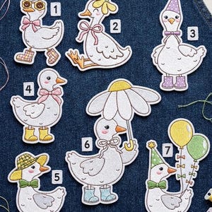 May include: A collection of seven embroidered patches featuring cartoon geese in various outfits. The geese wear accessories like sunglasses, party hats, and boots. Each patch has a unique design, including a daisy umbrella and balloons.