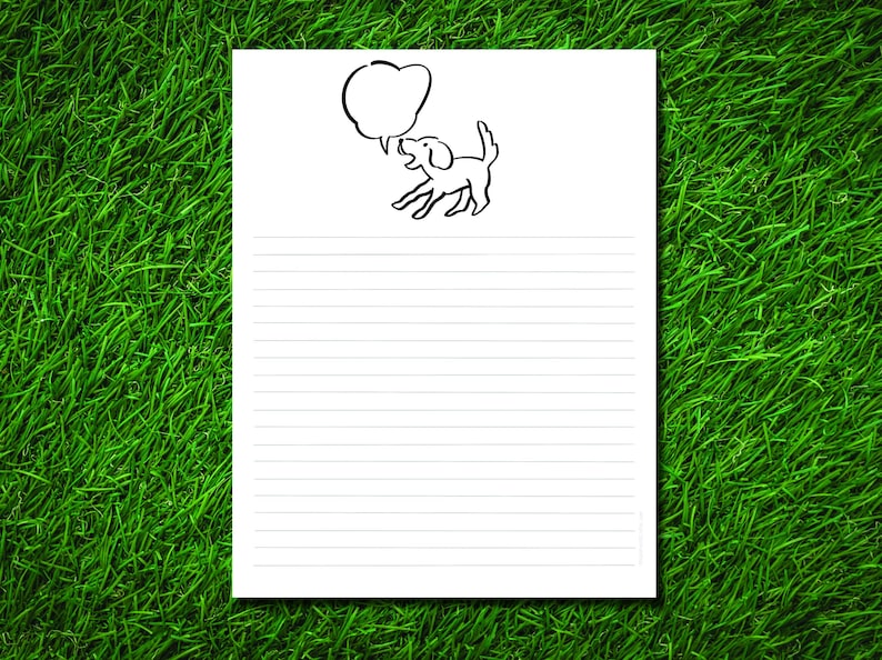 May include: White lined paper with a black line drawing of a dog with a speech bubble. The dog is jumping and appears to be barking. The paper is set against a background of green grass.