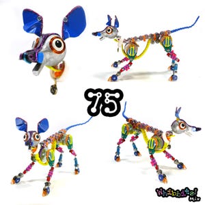 ¡Whibbit! Una réplica de un perro marioneta de animación stop-motion de 'Whibbits', hecha con materiales reciclados. ¡Cada modelo de la edición 'Mix' tiene una combinación de colores única!