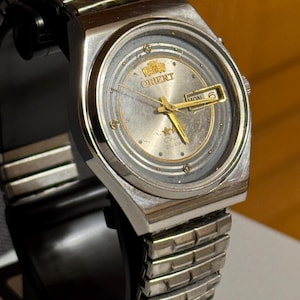 May include: A rustic wooden sign with the text "Welcome to our home" in a handwritten style. The sign features a distressed finish and a simple, inviting design, perfect for a front porch or entryway.