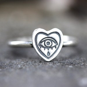Silver crying 2024 heart ring