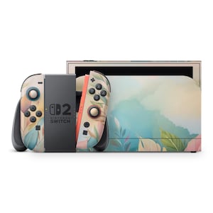 Peut inclure: Une console Nintendo Switch avec un motif floral pastel. Les manettes Joy-Con et le panneau arrière de la console présentent un motif de feuilles et de fleurs de style aquarelle dans des tons de rose, de bleu et de vert. La console est sur fond blanc.