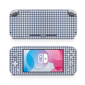 May include: A Nintendo Switch Lite console featuring a blue and white gingham design. The screen shows the Nintendo Switch logo against a colourful backdrop. The console is displayed from the front and back.