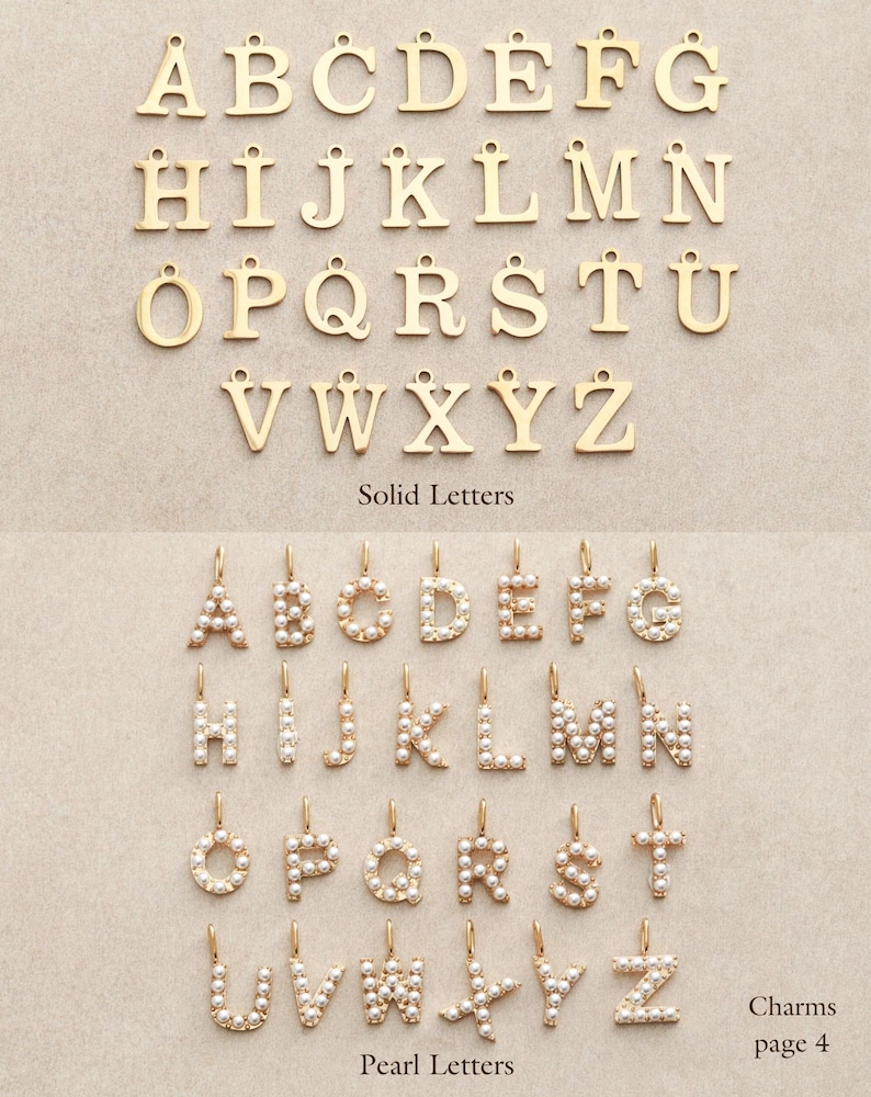 May include: A collection of gold-colored solid letter charms and pearl-studded letter charms. The upper section displays the alphabet in a simple, sans-serif font. The lower section shows the alphabet in pearl-covered letters. The text "Solid Letters" and "Pearl Letters" are below each set.