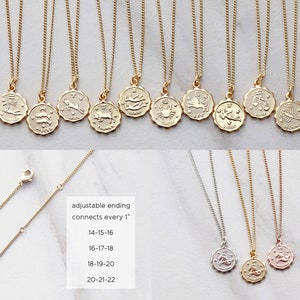 May include: Gold zodiac necklace with a variety of zodiac signs. The necklace is adjustable and connects every 1 inch. The chain is available in silver, gold, and rose gold.