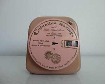 VINTAGE pink metal 'add a coin' COLLECTIBLE BANK - Columbia Savings and Loan Colorado's statewide savings institution - colorado collectible