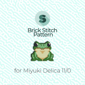 May include: Green frog beading pattern for brick stitch using Miyuki Delica 11/0 beads. The pattern is for a small frog with black eyes and a white belly.