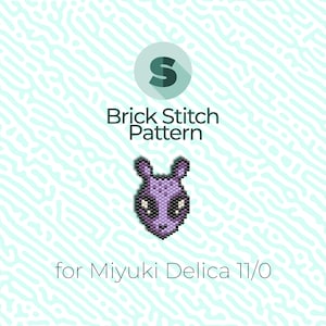 Peut inclure: Modèle de point de brique pour une créature violette et noire avec de grands yeux et des oreilles de lapin. Le modèle est à utiliser avec des perles Miyuki Delica 11/0.