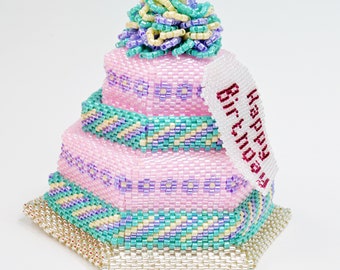 Beaded Birthday Cake Box Tutorial. Beading pattern to make a beaded box in the shape of a birthday cake, designed by Katie Dean.